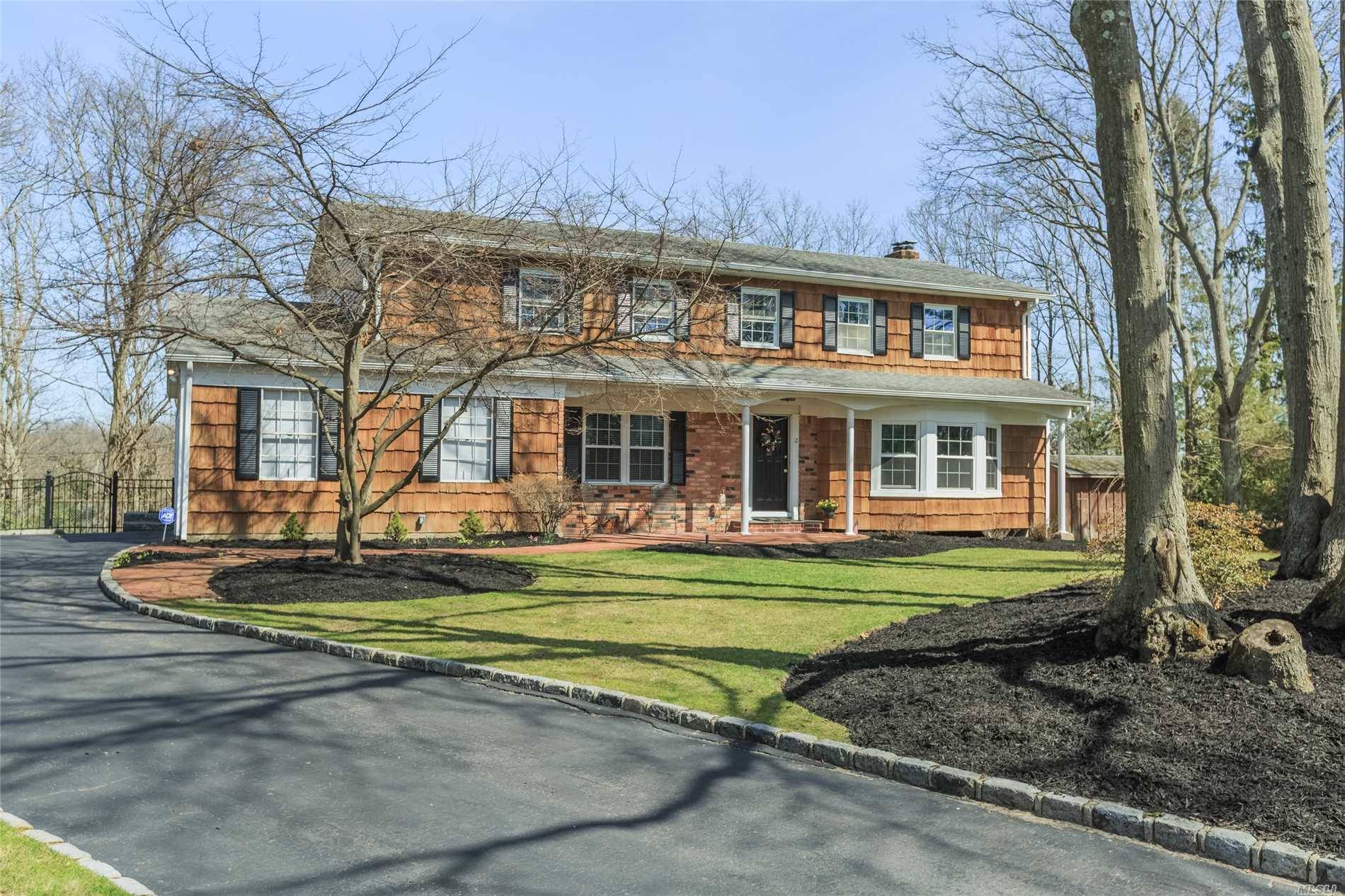Come See This Spacious 5 Bedroom Center Hall Colonial In The Desirable Legend Wood Community Of North Smithtown!