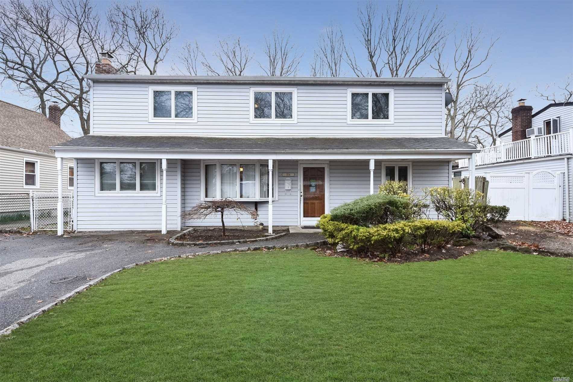 Meticulously Updated Colonial Located In Massapequa.
