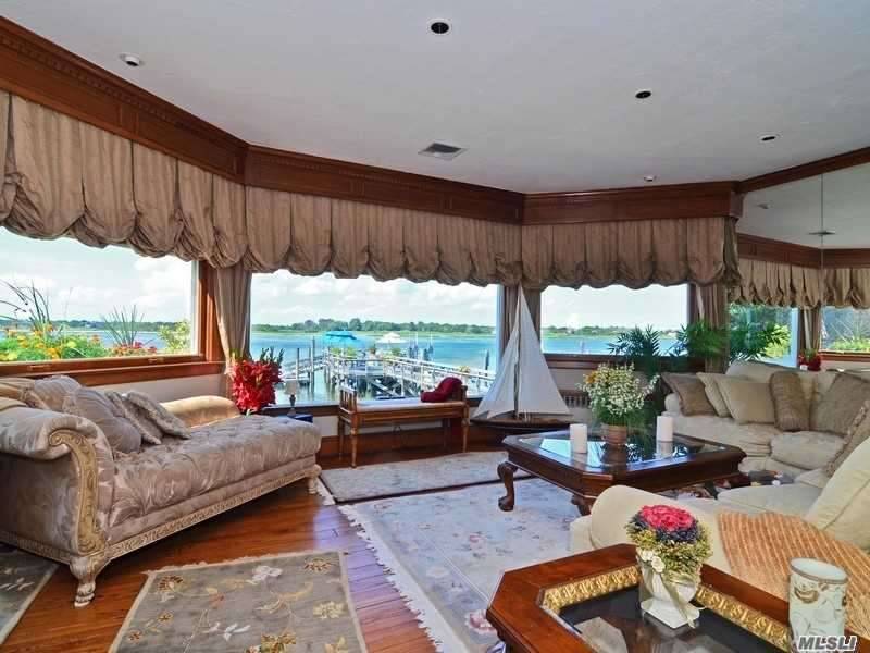 Welcome To This Timeless Waterfront 4 Bedroom, 4 Bath Home Sitated On Over 8000 Sq.
