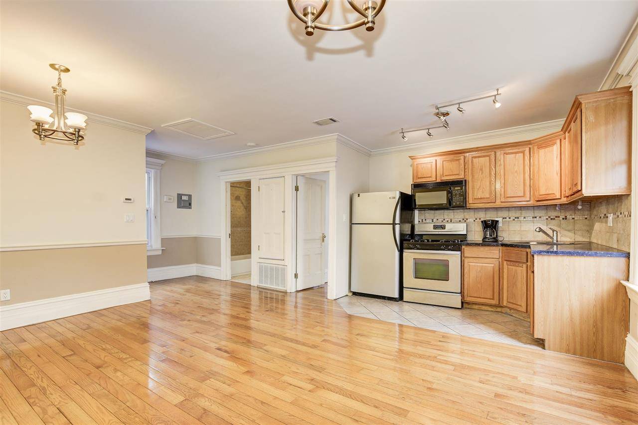 Charming two bedroom featuring hardwood floors throughout