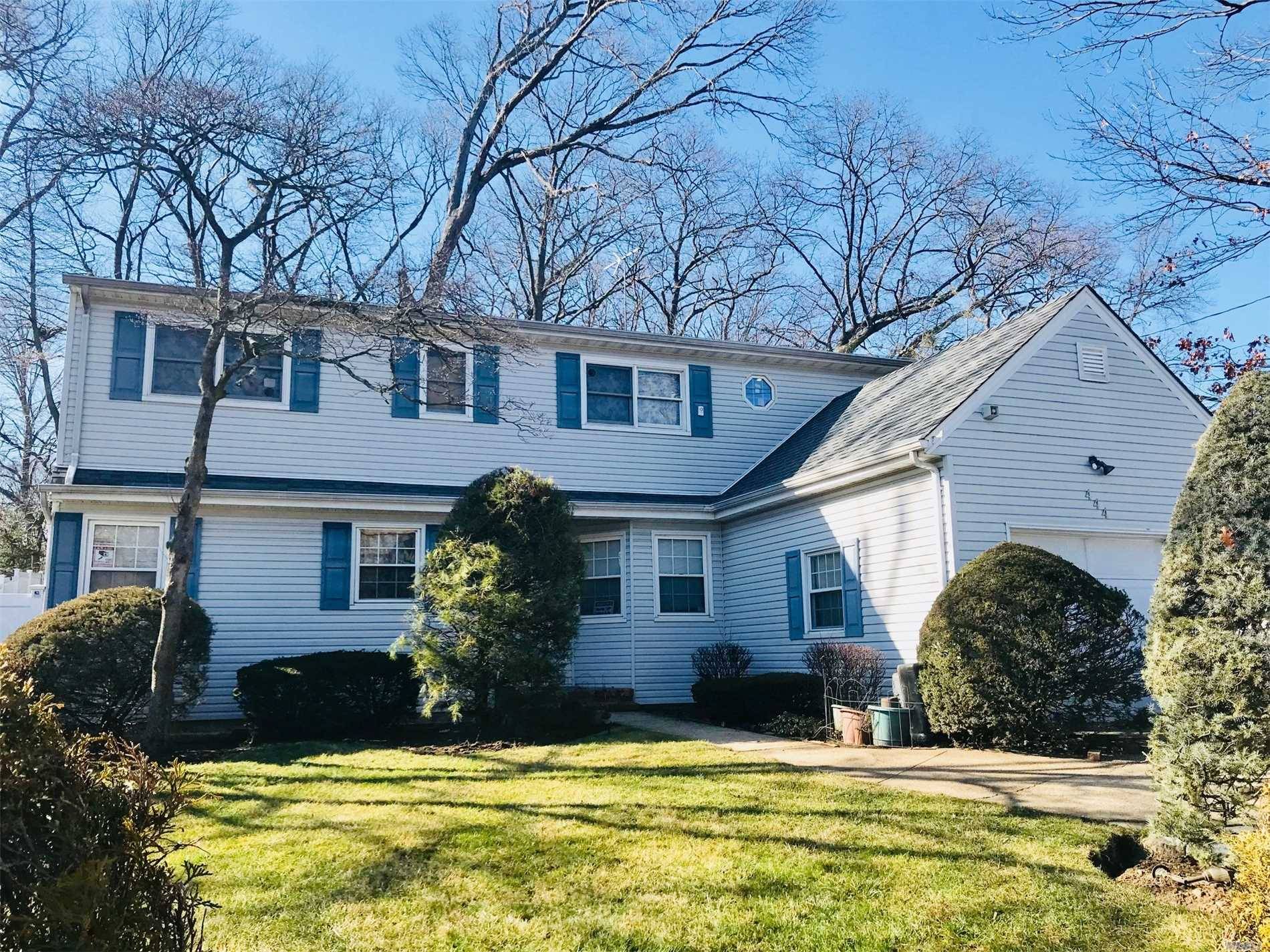 Magnificent 6 Bedrooms 4 Full Baths Updated Sun-Drenched Home For Sale In West Hempstead.