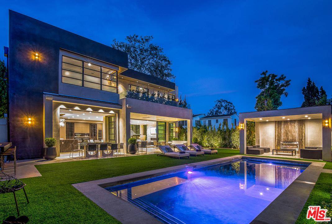 This newly constructed estate is a unique modern trophy in the heart of the Beverly Hills flats