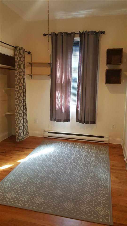 Check out this very cute updated 1 bedroom with private backyard