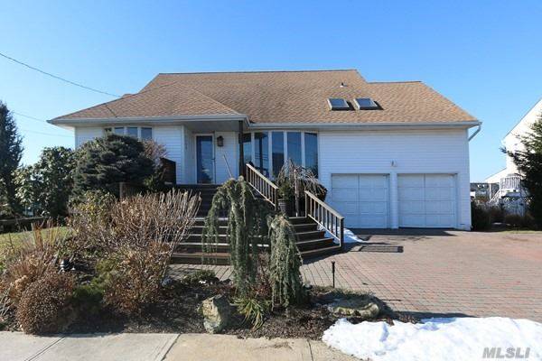 Gorgeous 4 Bedroom Split Level Home On The Mouth Of The Open Bay.
