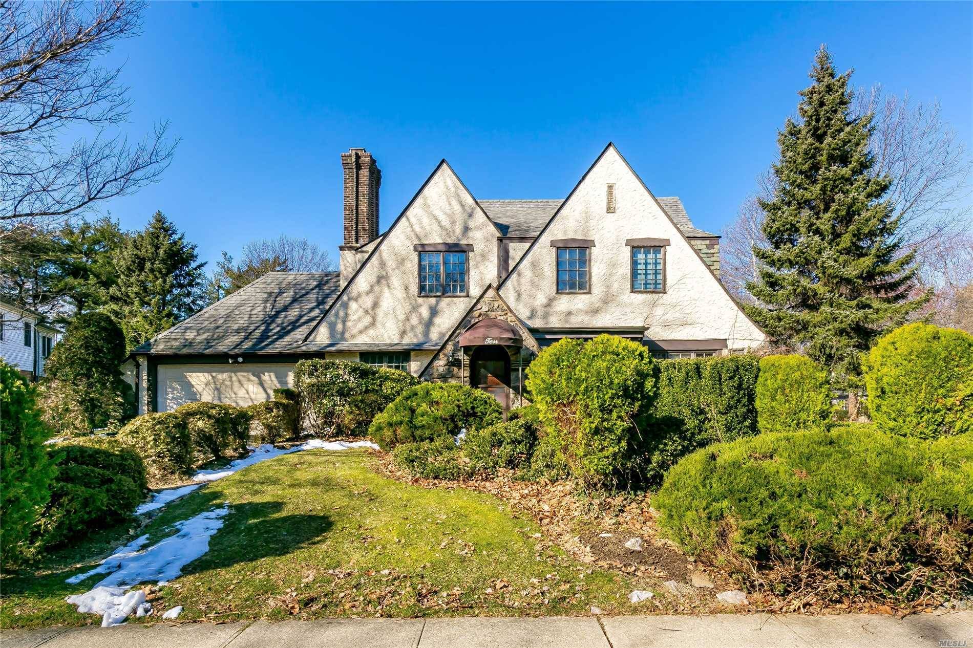 Russell Gardens Elegant Tudor Home With 5 Bedrooms And 3 Full Baths.