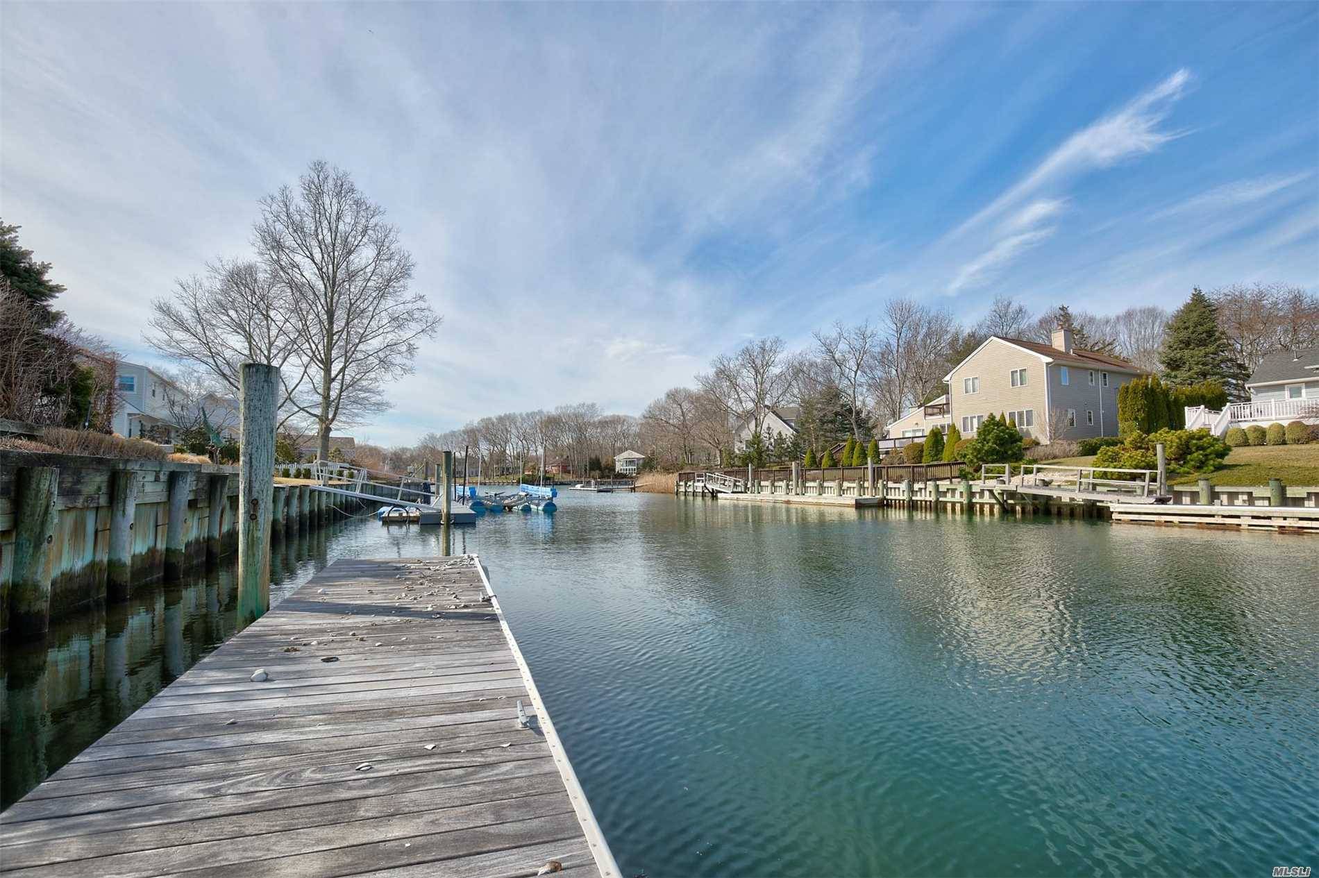 Waterfront 4 Bed, 3 Bath Contemporary With A Deeded Deep Water Dock And Separate Boat Slip.