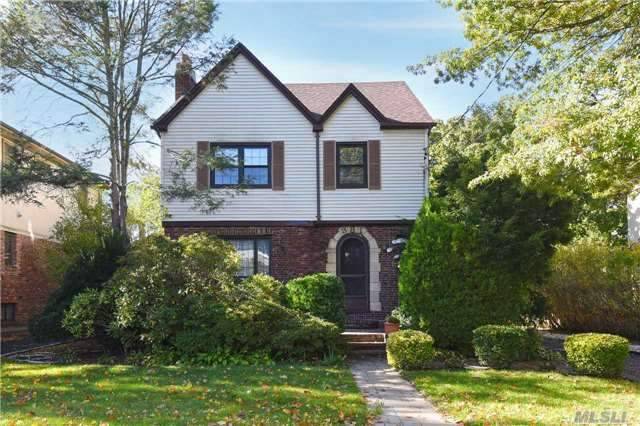 Warm & Welcoming Brick Colonial In Academy Area.