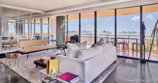 Large 3 Bedroom 2 bath completely renovated corner unit with breathtaking unobstructed panoramic views of Biscayne Bay