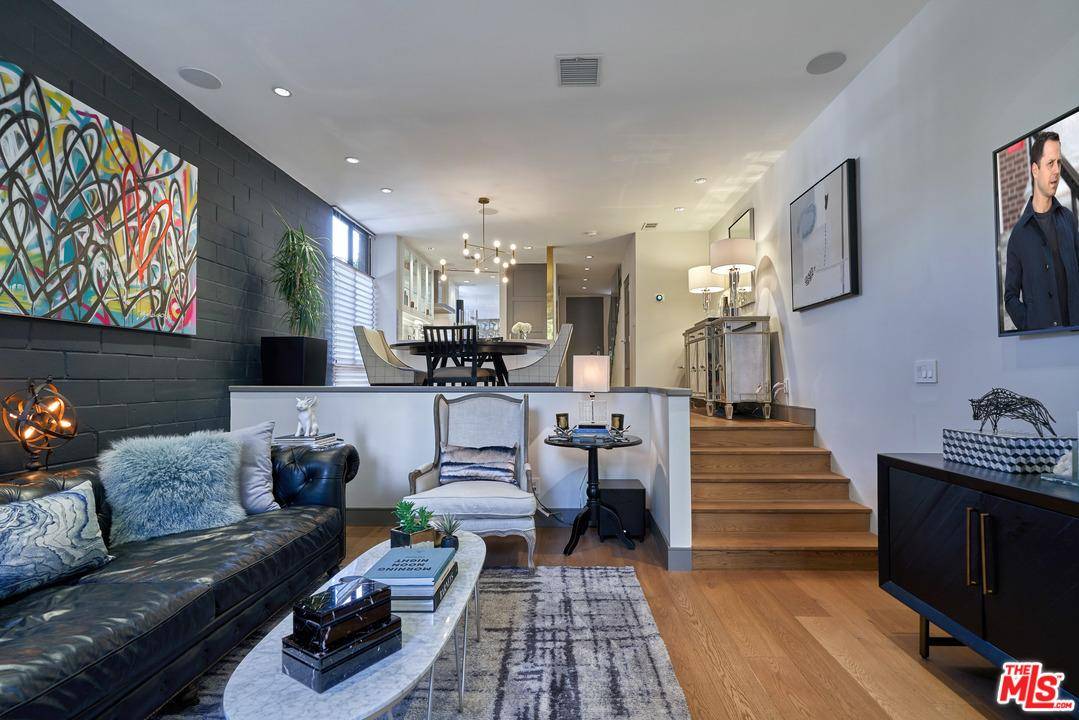 This exceptional architectural townhome in the award-winning