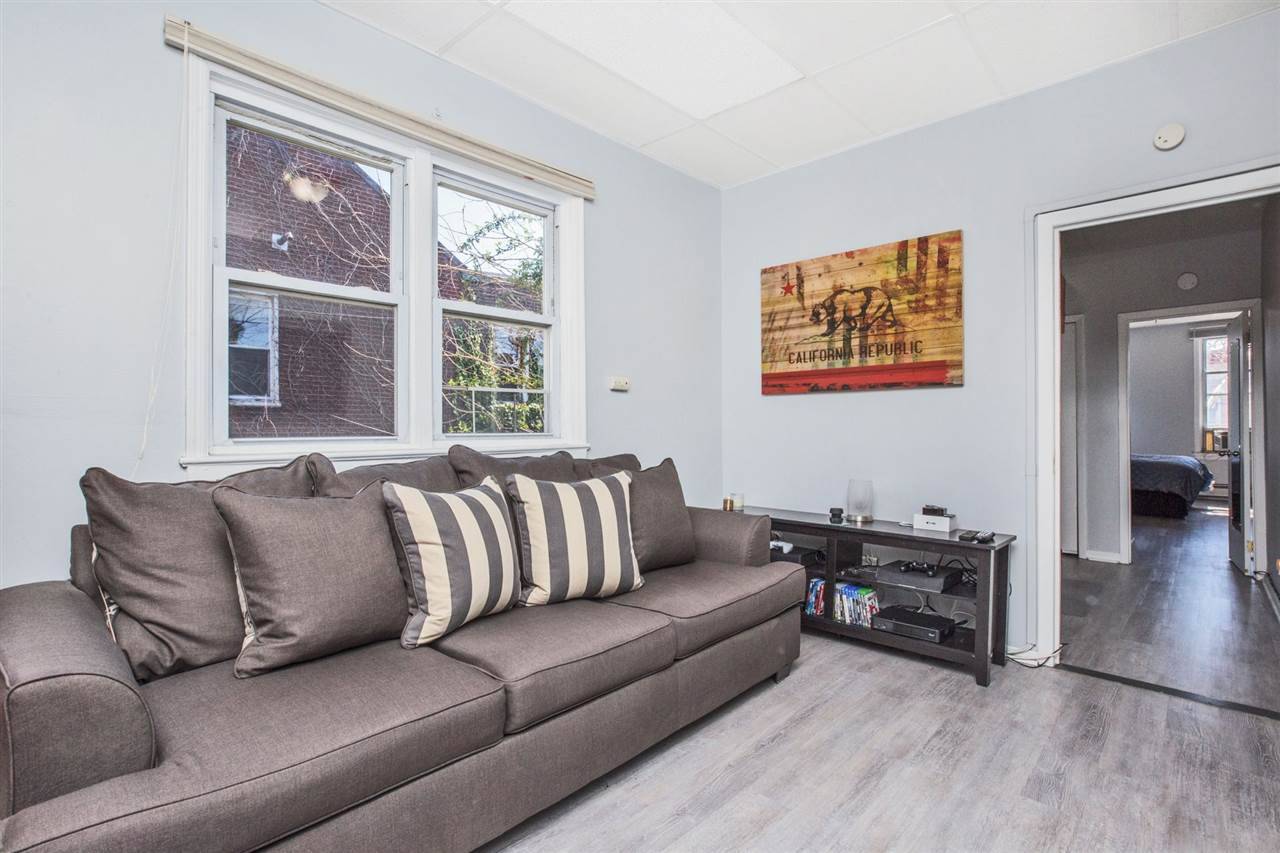 Newly renovated large sun drenched two bedroom or one bedroom with bonus office/den in great Heights location