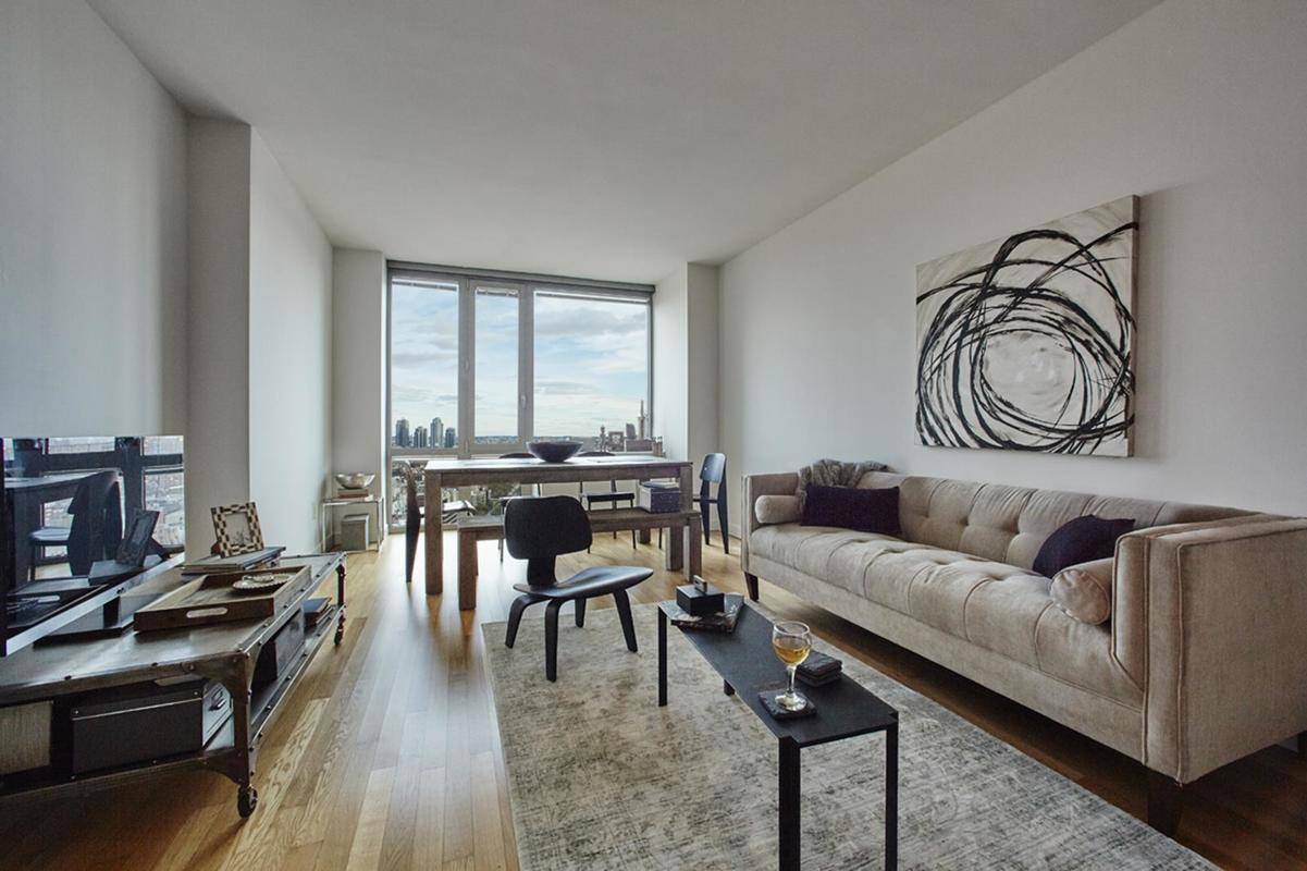 LARGE ALCOVE STUDIO W/ STUNNING WINDOWS IN LUXURY LOWER EAST SIDE BUILDING