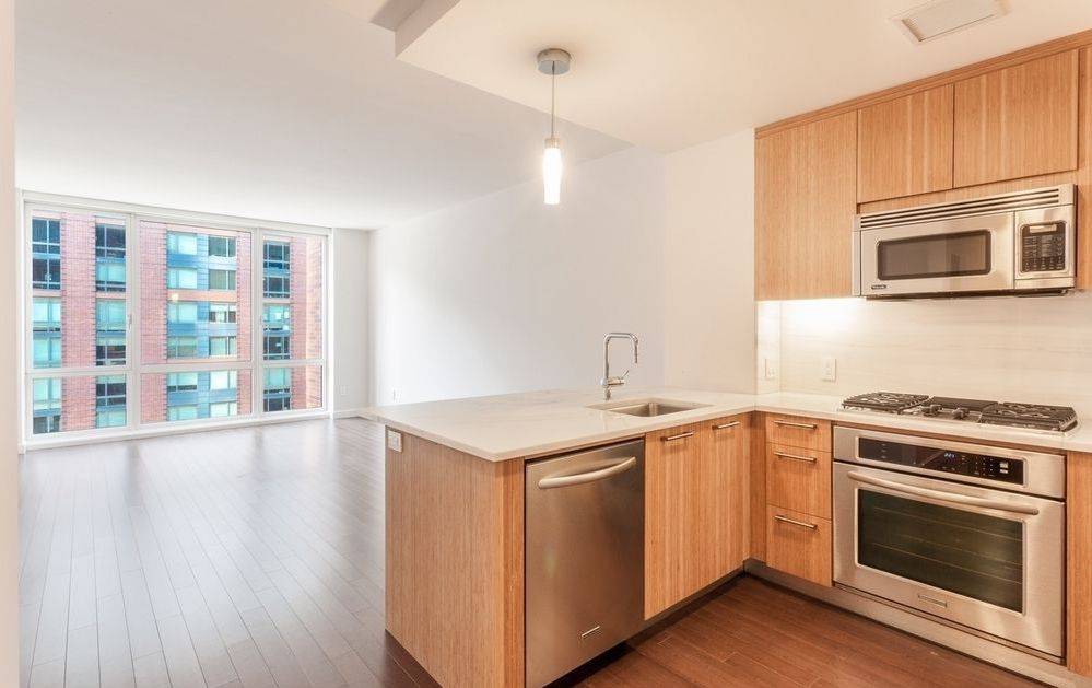 DELUXE 1 BEDROOM WITH PREMIUM FINISHES IN LUXURY BATTERY PARK CITY BUILDING