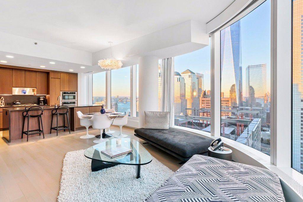 Breath Taking Apartment Interior With Wall Of Windows - Chef's Kitchen, Walnut Cabinetry & Black Granite Countertops Included - Financial District