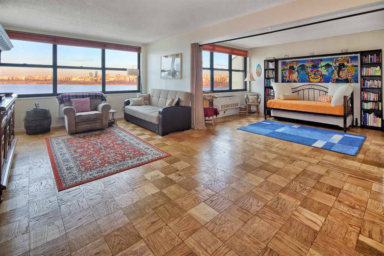 Fabulous Forever views of New York City & Hudson River abound in this Sprawling 2/3 Bedroom convertible+Den 2 Bath Home