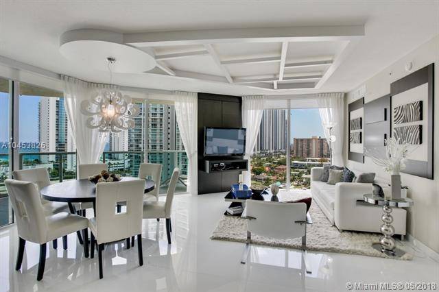 This spectacular 3 bedroom/ 2 bath features fabulous water/ city views from every room