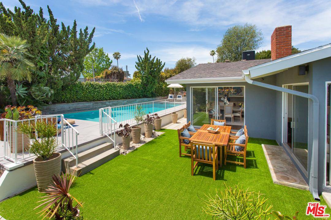 Tucked away on a quiet street just minutes from Sunset Boulevard lies this gem of a property