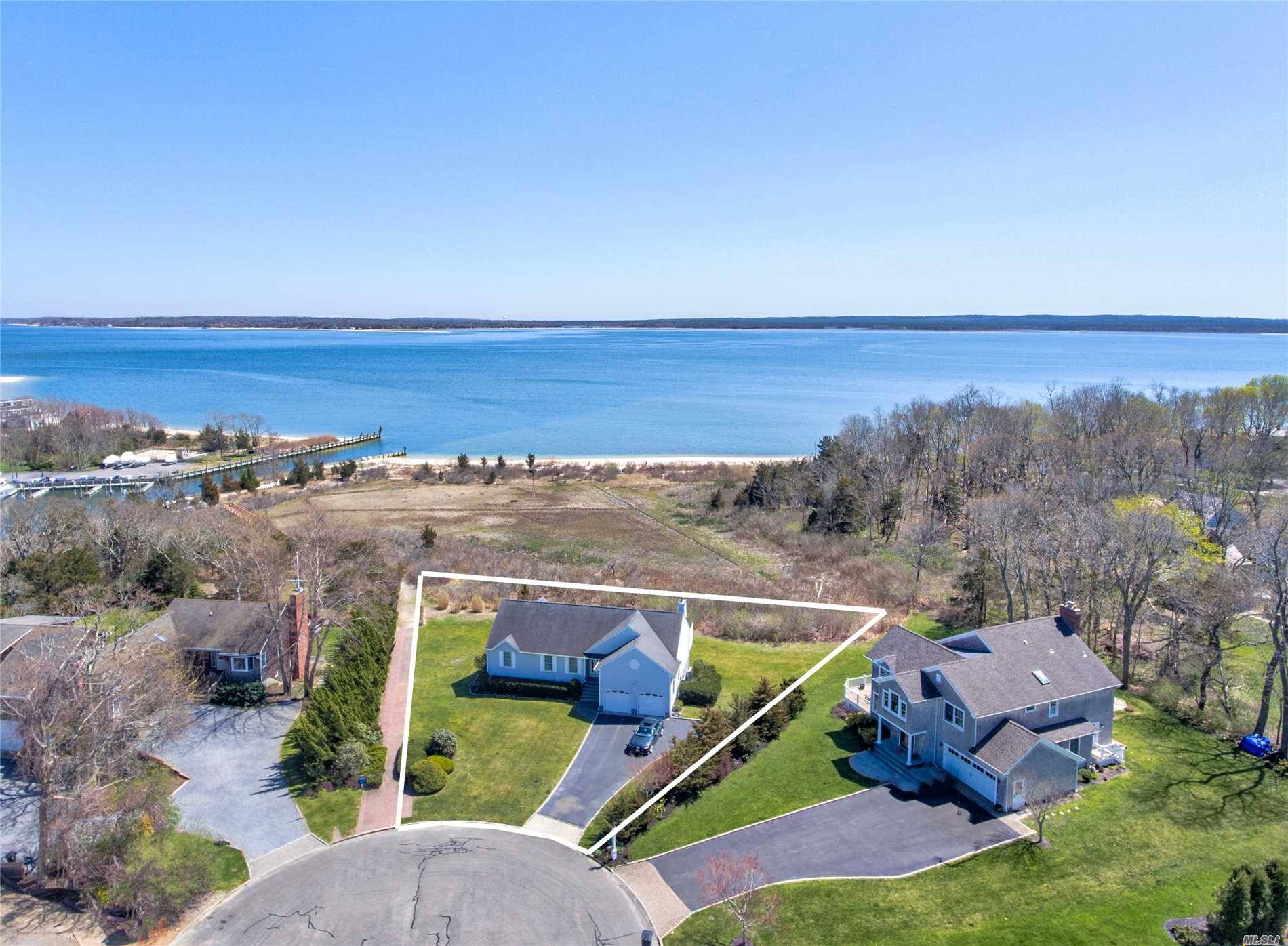 Enjoy True North Fork Living In The Meticulously Maintained Waterfront Home That Is Just Steps Away From Its Own Exclusive Association Beach.