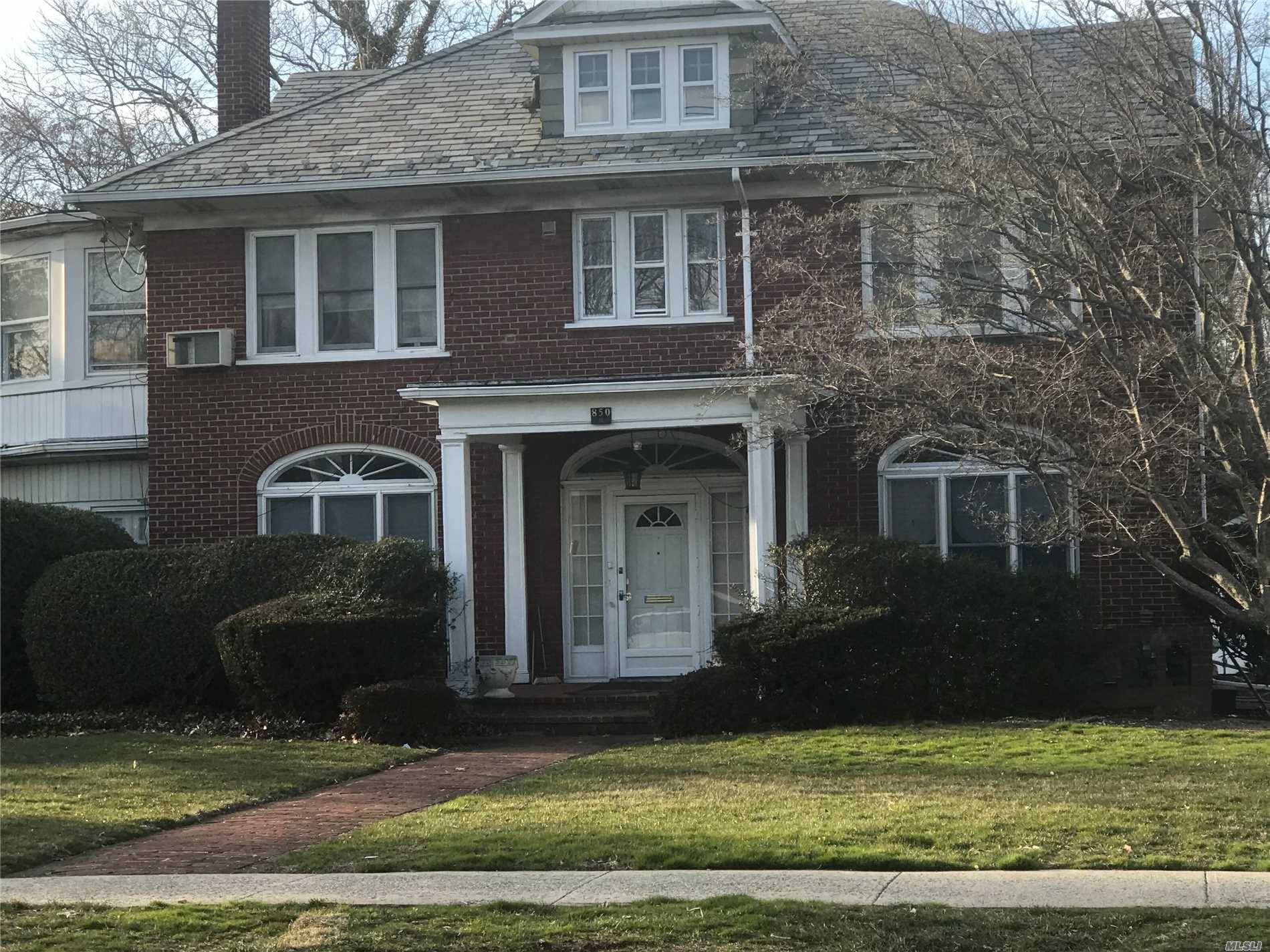 Grand  Brick Ch Colonial With High Ceilings Throughout,Large Formal Dining Room, Eik Den, Enclosed Porch Plus Bedroom And Full Bath.