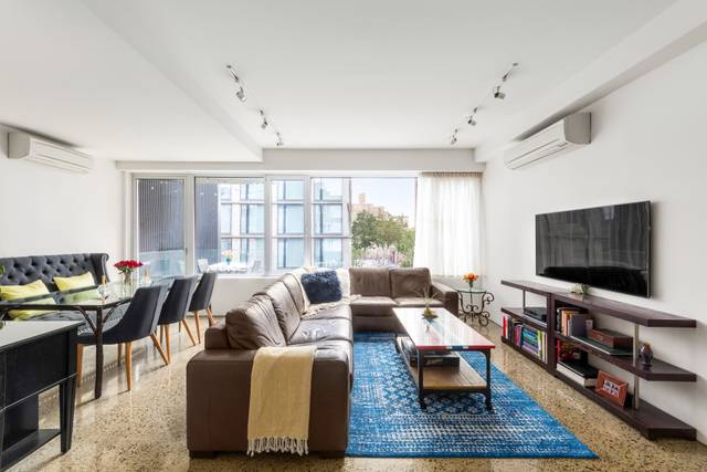 This pristine, perfectly scaled 2 bedroom 2 bath condominium, completed in 2016, overlooks Herzog de Meuron's Masterpiece, Ian Schrager's Public Hotel on one side and the Museum of Photography on ...