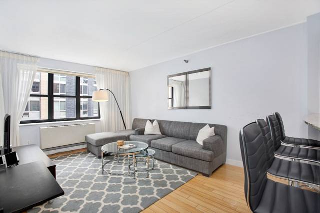 Enjoy spacious and bright living spaces and top notch amenities in this two bedroom, two bathroom home in a prized Hell's Kitchen Midtown West condominium.