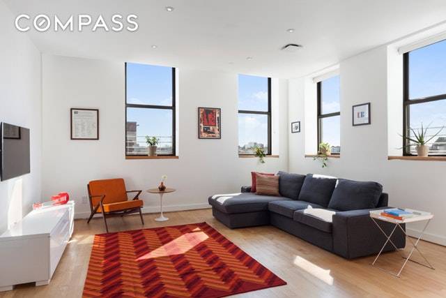 Sunlight pours into this special two bedroom corner apartment in an elevator building in prime Boerum Hill.