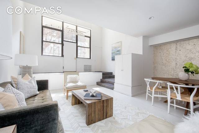 This newly updated two bedroom plus home office West Village residence offers the intimacy of townhouse living coupled with the convenience of a well run condominium.