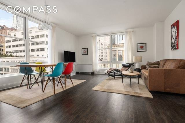 This radiant corner unit faces south and east with light splashing through the spacious two bedroom residence.