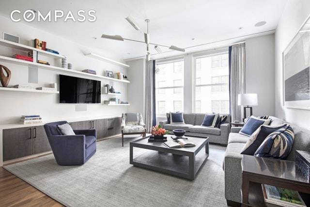 Superior finishes and large, airy living spaces are the hallmark of this spectacular, mint condition two bedroom, two and a half bathroom condominium in a historic Flatiron District building.