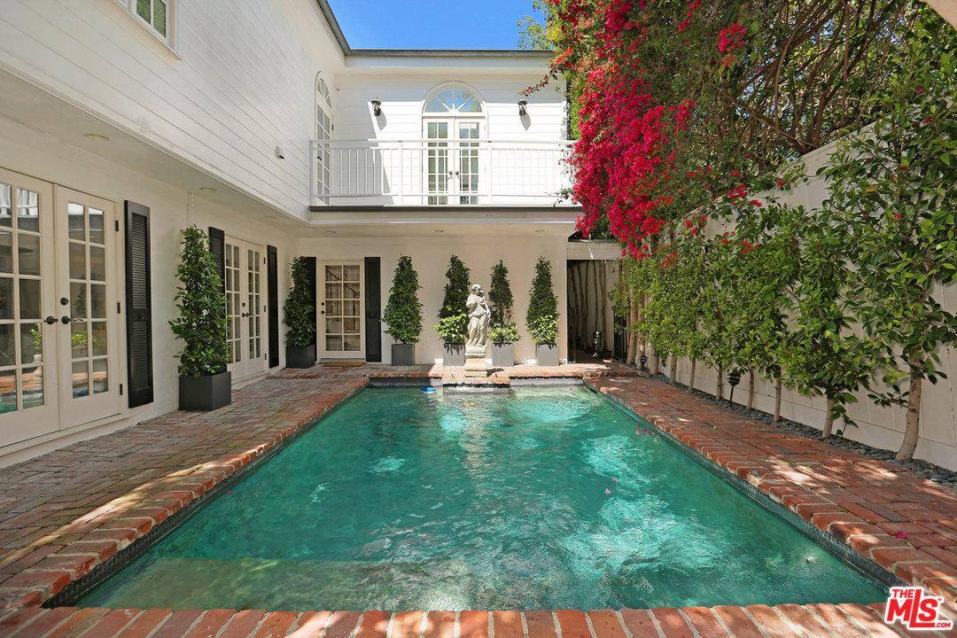 SIMPLY THE BEST PRICED UPDATED FAMILY HOME NORTH OF SUNSET IN THE CITY OF BEVERLY HILLS