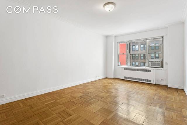 Located in one of Midtown s finest residential building, this beautiful alcove studio offers a great open layout with classic pre war charm.