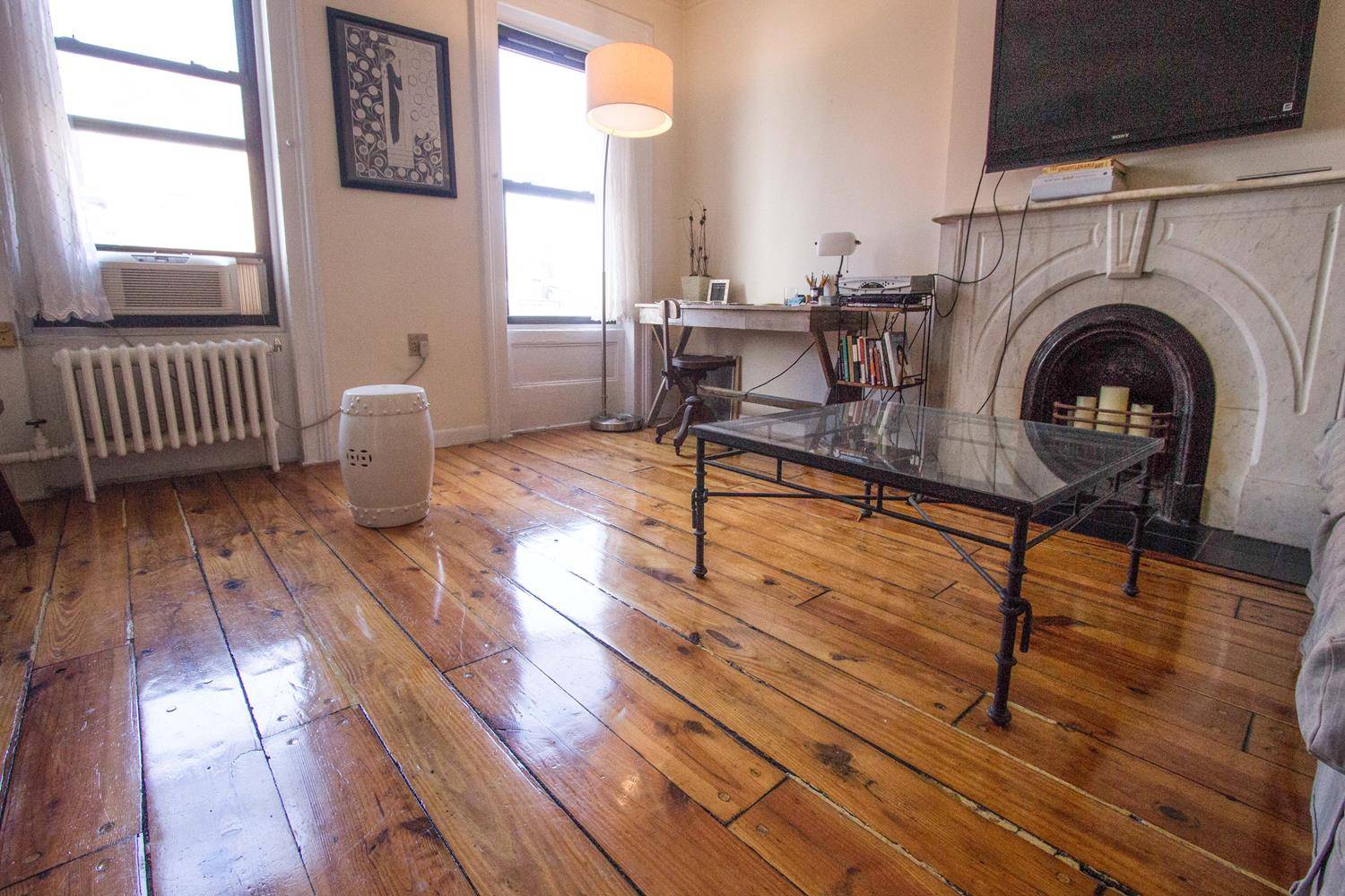 Greenwich Village, 19 Bank Street, Large, L shaped Alcove StudioApt 3RRenovated Alcove Studio Apt in Historic Brownstone with high ceilings, ceramic bathroom, Wide Plank Yellow Pine Floors, decorative marble fireplace ...