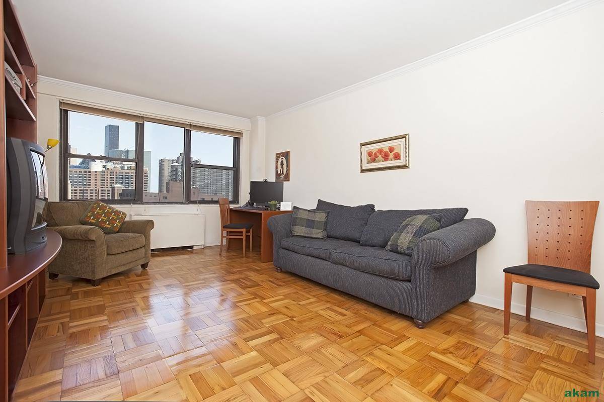High atop the building sits this large One Bedroom with sweeping views and excellent light.