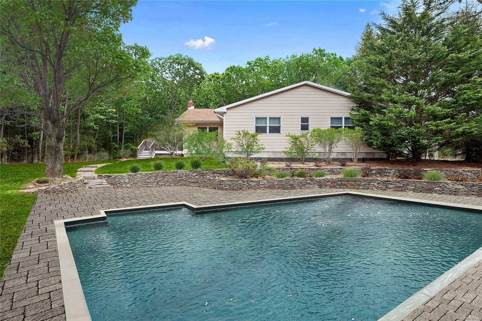 This Open Layout Contemporary Is Centrally Located In East Hampton And Is Situated At The End Of A Quiet Cul-De-Sac.