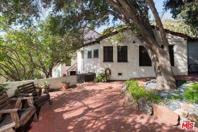 Hidden away on a quiet street yet just a stones throw to picturesque and rustic Beachwood Village