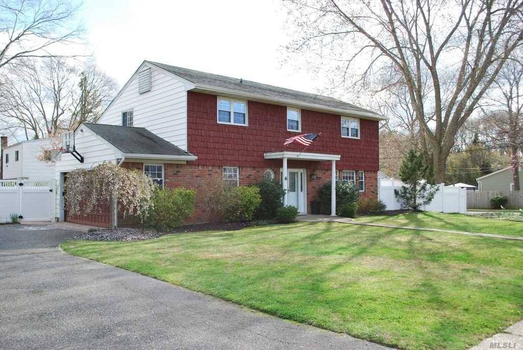 Immaculate Spacious Home Located In Top Rated Sayville School District Featuring 4 Bedrooms, Finished Basement And 1.