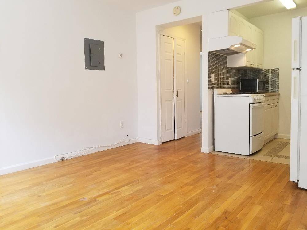 Beautiful Two Bedroom in the heart of Long Island, this floor through apartment features rich hardwood floors, brand new bathroom, washer dryer in unit and abundant closets.
