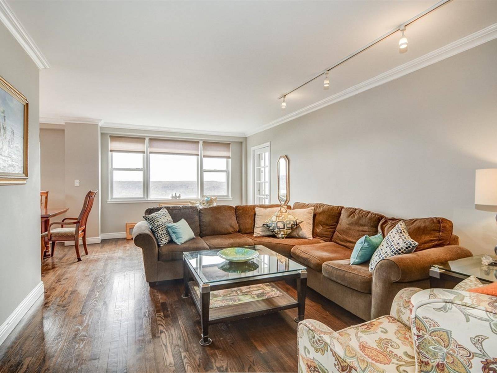 Spectacular Hudson River views and light in every room of this high floor, grand two bedroom apartment.