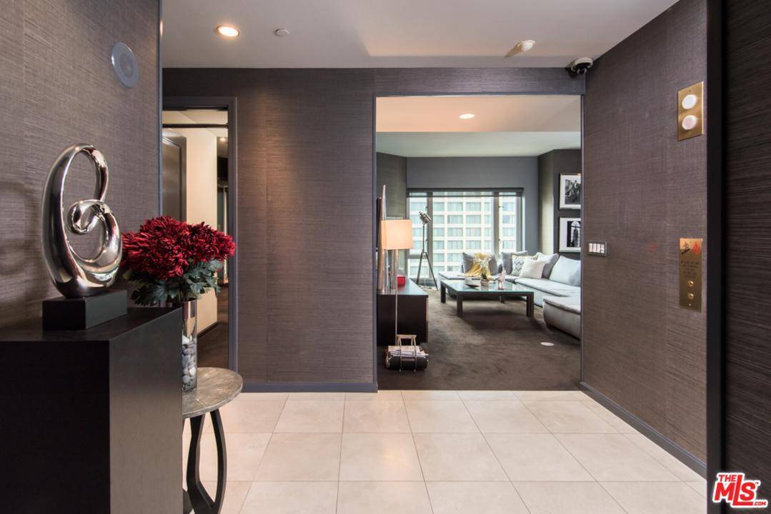 Spacious and sophisticated corner unit condominium in the prestigious full service Remington
