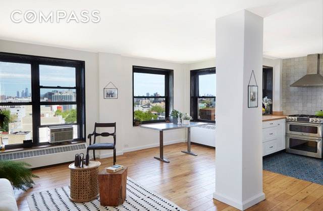 Bathed in light with all around uninterrupted views of Manhattan this apartment screams out Home.