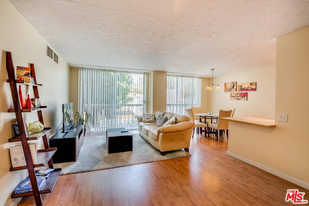 Light bright hard to find North facing unit on the famed Wilshire corridor