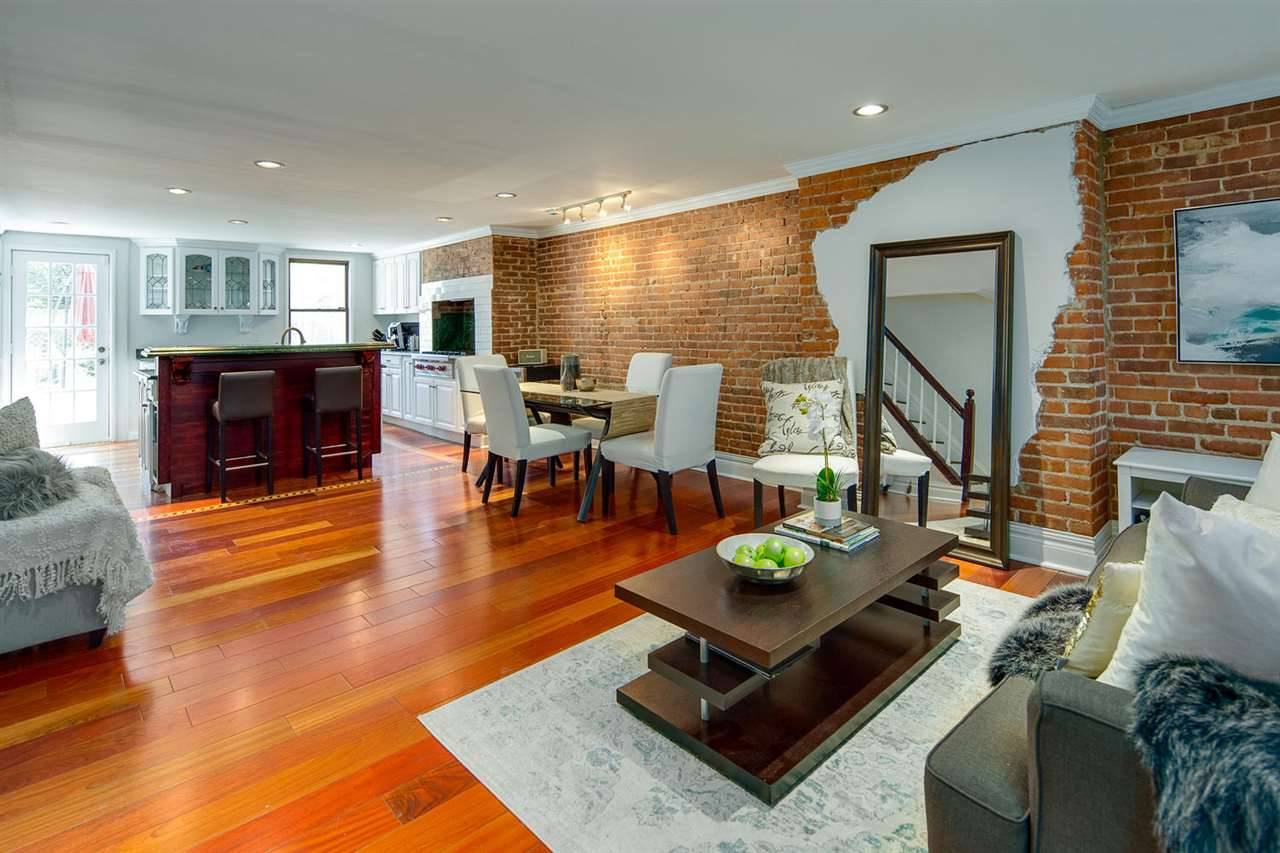 Remarkable single family brownstone in the heart of historic downtown Jersey City