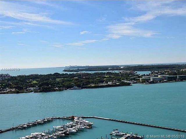 Beautifully remodeled top to bottom - YACHT CLUB 2 BR Condo Miami Beach Florida