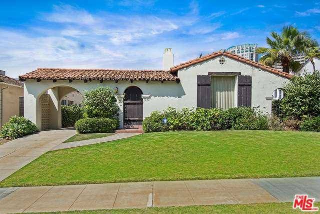Located on a great quiet street in a prime Westwood neighborhood sits this authentic Spanish home with 3 bedrooms & 2 bathrooms