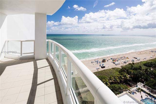 Enjoy awe-inspiring sunrises & sunsets from your oceanfront balcony in this 2 BR/2BA beautifully renovated unit on Millionaire's Row