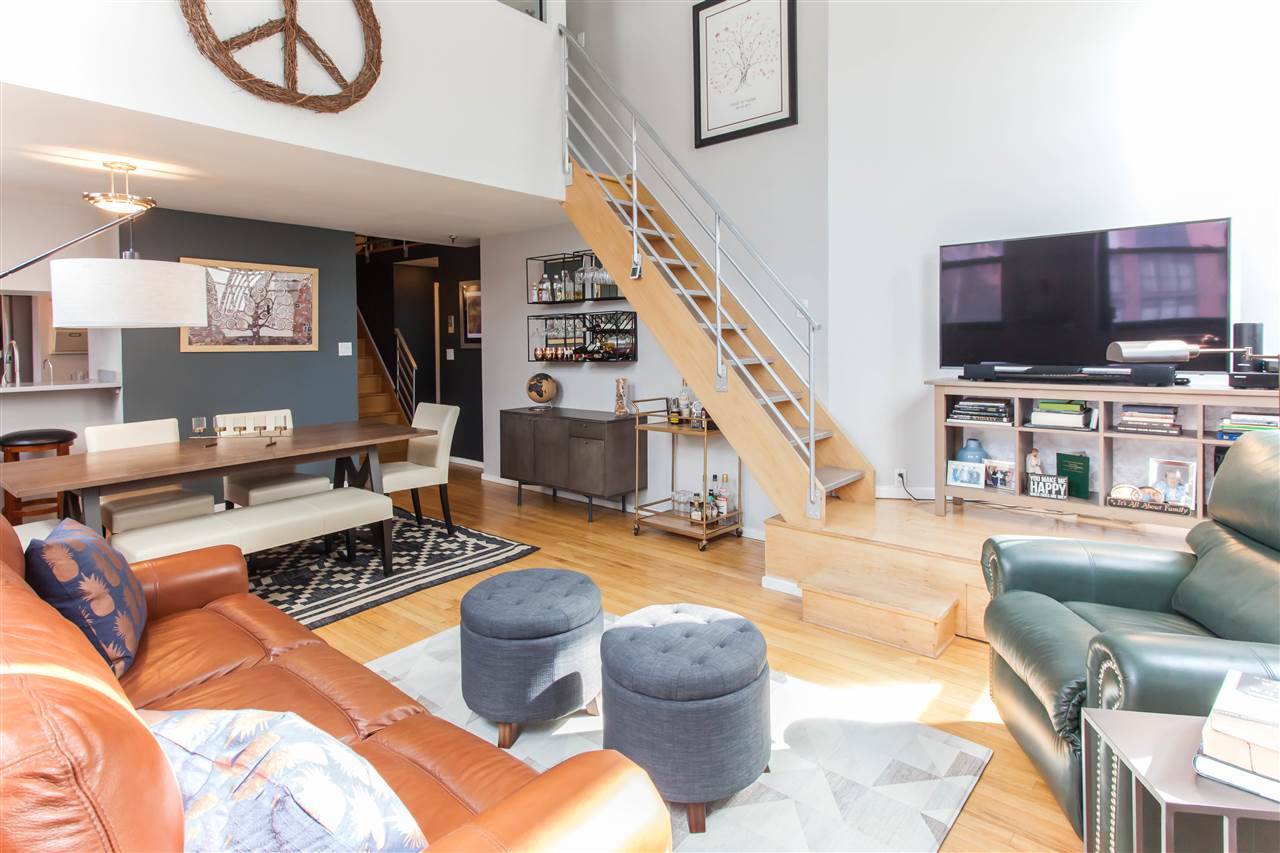 Welcome home to this modern loft at the landmark Hoboken Schoolhouse