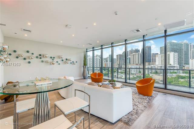 Enjoy the Brickell Lifestyle in this boutique building on the most quiet street in the area