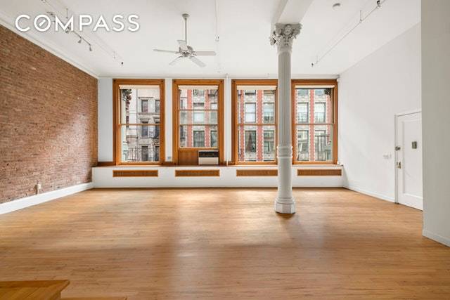 Last of its kind, Hollywood movie style Soho 5700' classic loft 14' ceiling height, cast iron columns, brick walls and maple floors.