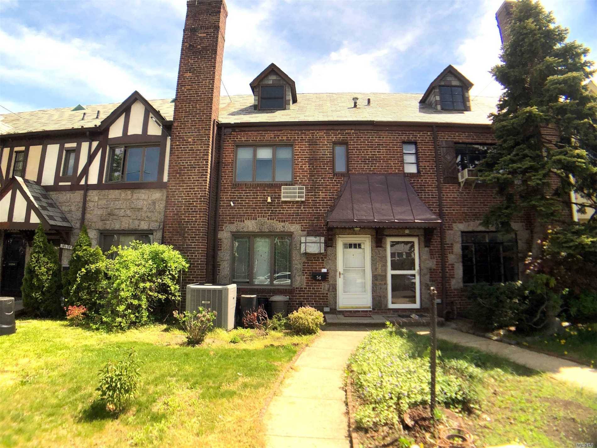 Beautifully Updated 18' Attached Brick House Located In The Heart Of Kew Garden Hills.