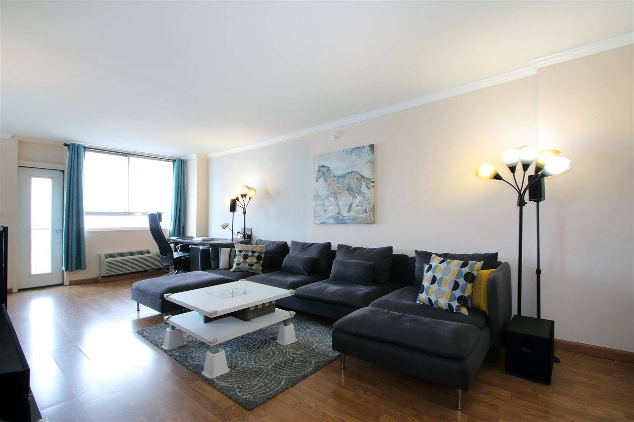 Elegant two bedroom two bath apartment depicting a panoramic NYC and river view from every window