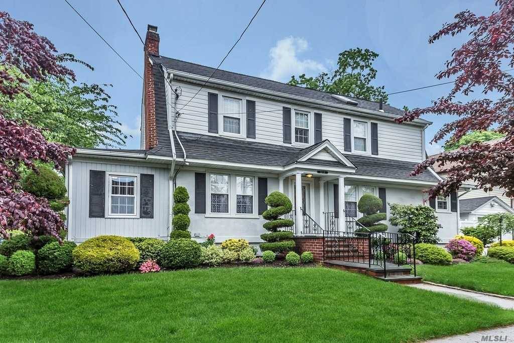 Immaculately Maintained 3 Bedroom Corner Property Colonial With Meticulous Landscaping.